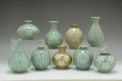 These miniature vases were hand-thrown and hand-carved with floral patterns and they come in all sorts of shape and size.  The patterns include cherry blossoms, lotus flowers, dandelions, peonies, water lilies and daisies.  They are adorable just by itself ... and can also function bud vases or reed diffusers.  Simply add diffuser oil and reeds.